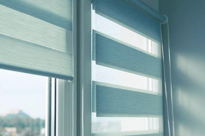 candles with inscription home windowsill with beautiful blinds